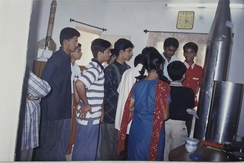 Praveen Kumar Gorakavi — Explaining inventions to visiting student groups — inspiring the next generation